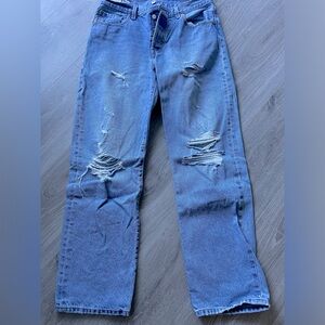Women’s  Distressed Blue Levi’s jeans